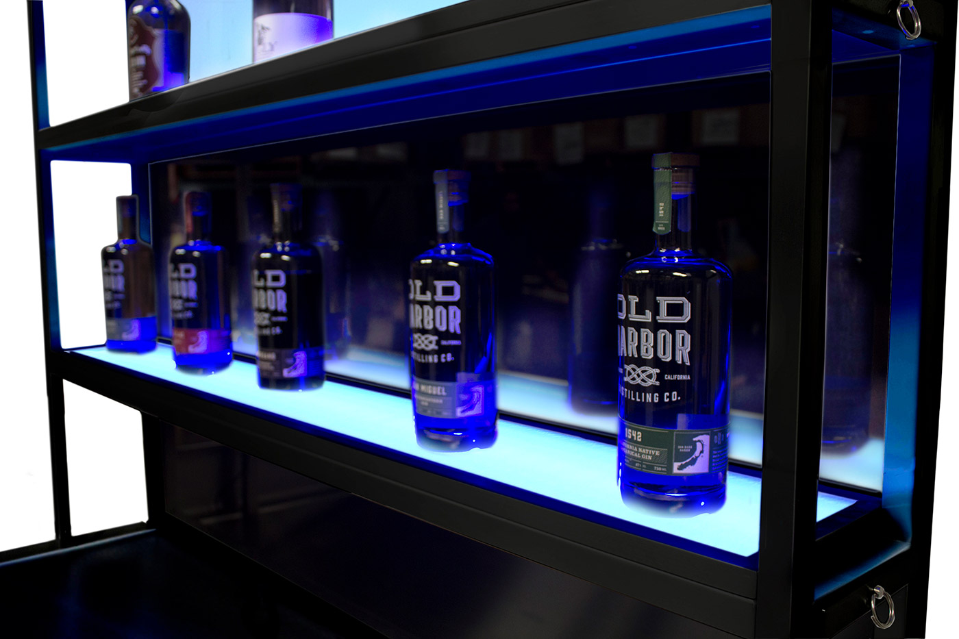 Fold & Roll Back Bar -LED lighted shelving illuminating the bottles